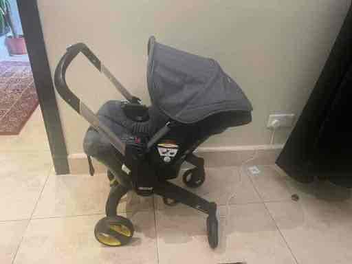  Doona Travel Baq And Car Seat Base - Rear - Facing Latch System  — 3